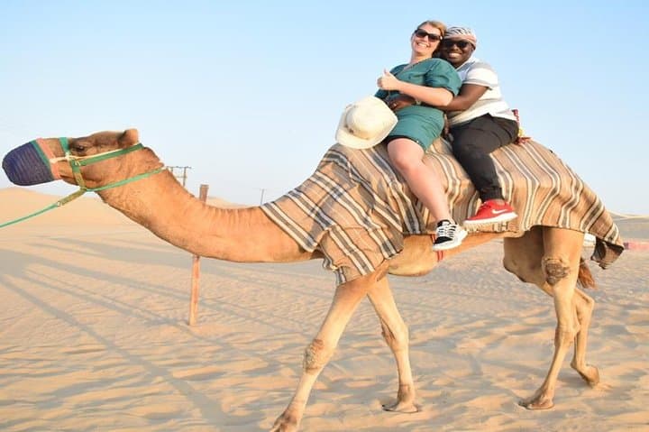 Evening Desert Safari in Dubai: Dune Bashing, Camel Ride & Sandboarding at Sunset photo 3