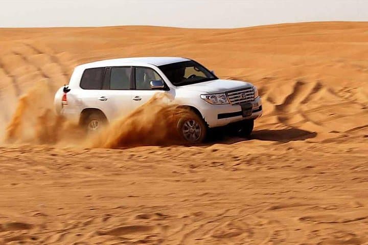 Evening Desert Safari in Dubai: Dune Bashing, Camel Ride & Sandboarding at Sunset photo 5
