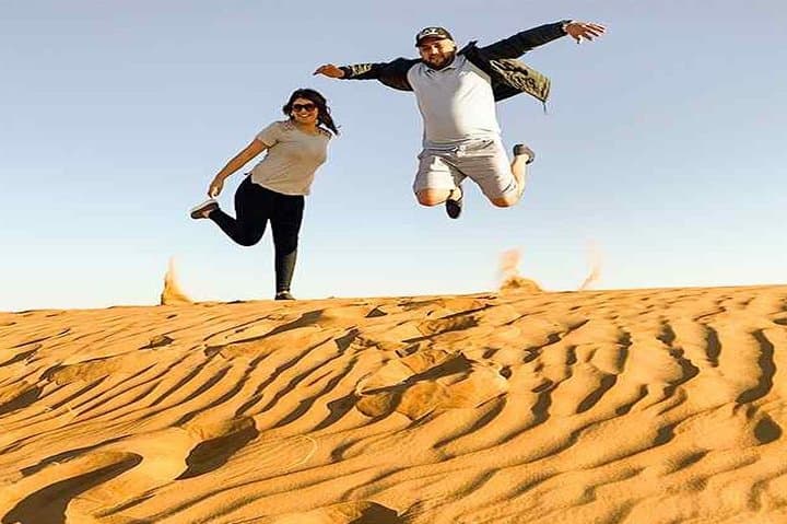 Evening Desert Safari in Dubai: Dune Bashing, Camel Ride & Sandboarding at Sunset photo 6