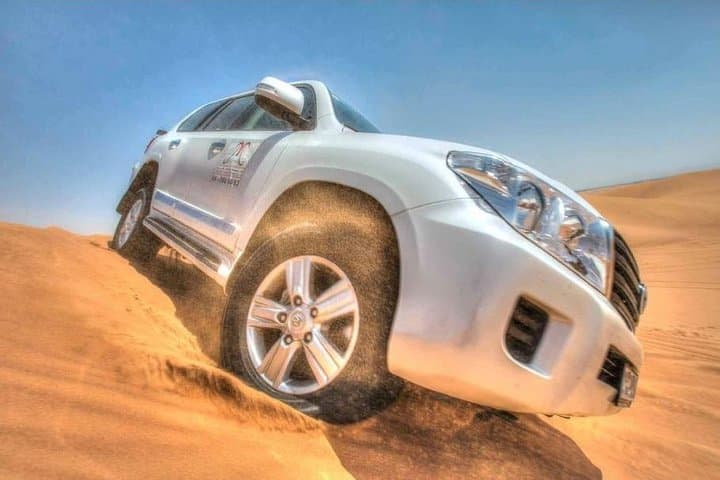 Dubai Red Dune Desert Safari — 4-Hour Dune Bashing, Camel Ride & BBQ Experience photo 3