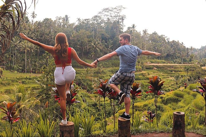 Bali Swing & Ubud Day Tour: Tegalalang Rice Terraces, Kanto Lampo Waterfall, and Temple Walk photo 2