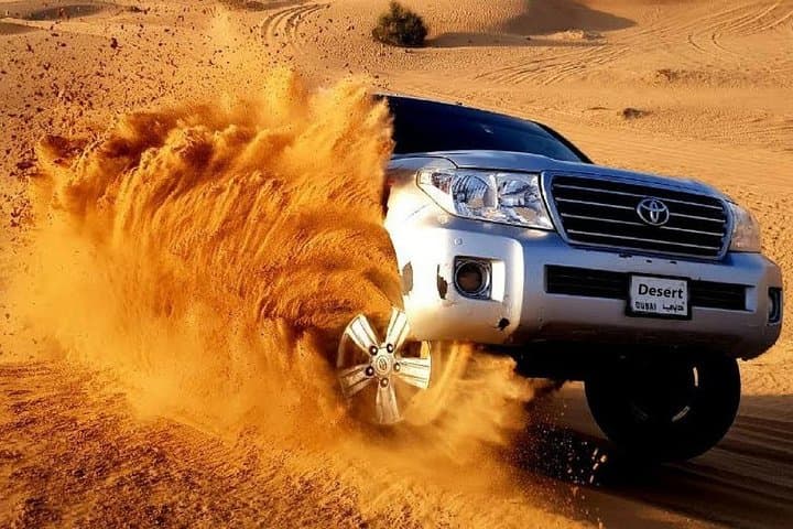 Dubai Desert Safari with BBQ Dinner, Dune Drive & Bedouin Camp Experience