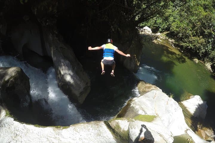 Canyoning Los Anillos Route: Waterfall Slides and Deep-Pool Jumps in Vallejuelo