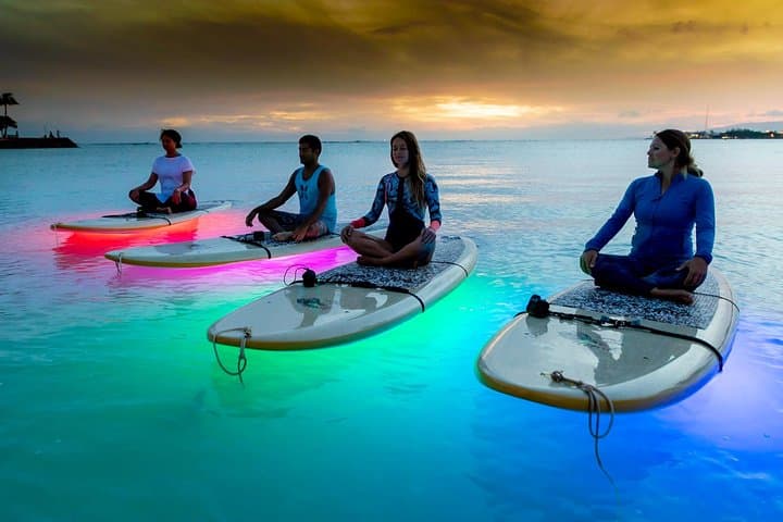 Night SUP Yoga in Honolulu: Paddle, Glow, and Flow on Magic Island photo 3
