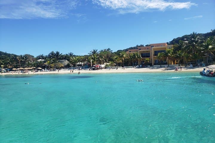 Private Parasailing Over West Bay Beach with Chocolate & Rum Tasting photo 2