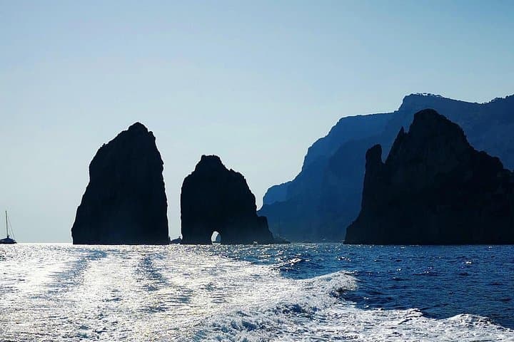 Capri small-group boat tour with aperitif — faraglioni, caves & coastal swim photo 2