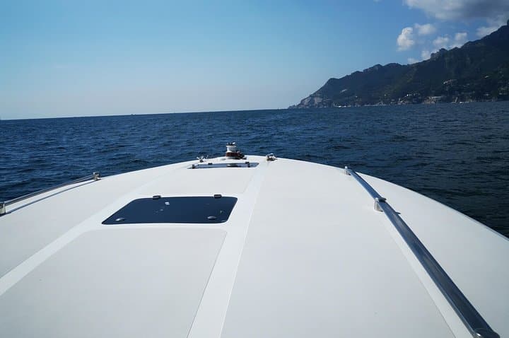 Capri small-group boat tour with aperitif — faraglioni, caves & coastal swim photo 4