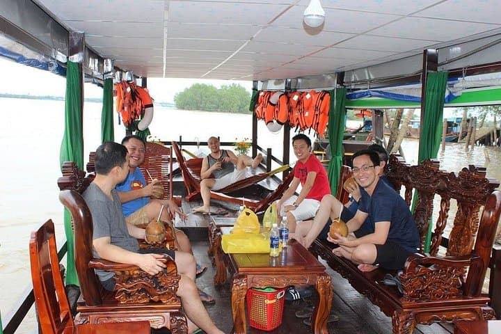 Private Mekong Delta Day Tour: Boat Ride, Coconut Island & Riverside Lunch photo 1