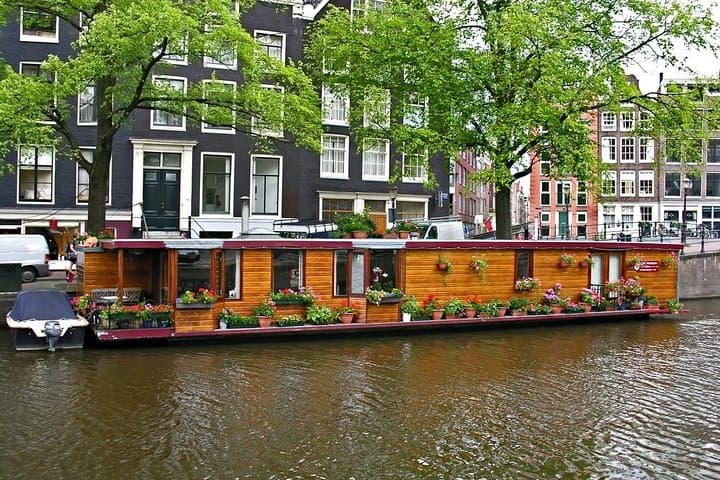 From Canals to Clogs: Private Amsterdam Tour with Zaanse Schans Windmills & Cheese Tasting photo 6