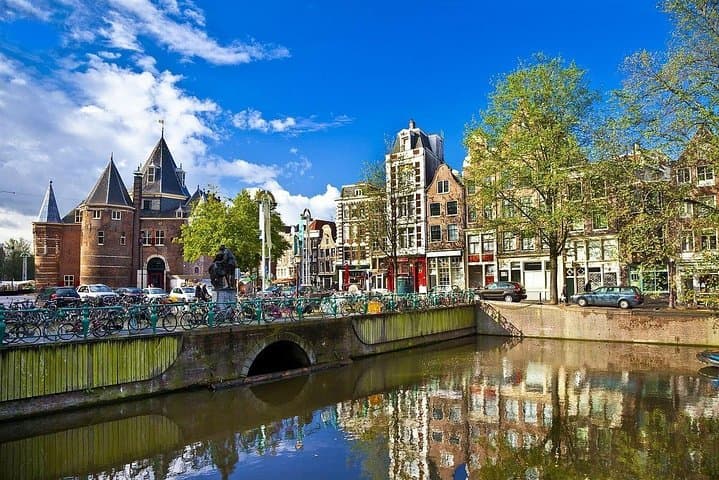 From Canals to Clogs: Private Amsterdam Tour with Zaanse Schans Windmills & Cheese Tasting