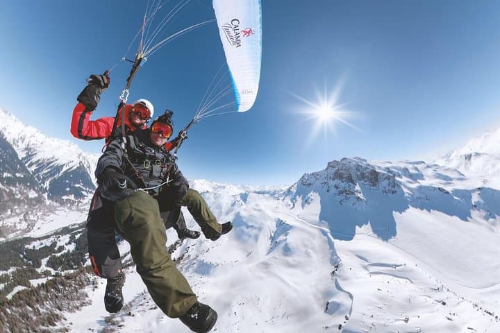 Soar Together Over Klosters: Tandem Paragliding for Two with Photos photo 2