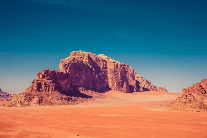 Full-Day Wadi Rum Jeep Tour: Red Dunes, Sandboarding & Bedouin Tea