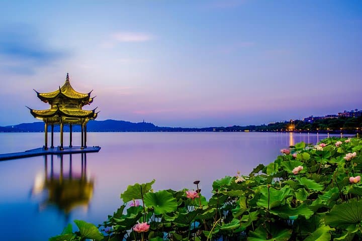Hangzhou UNESCO Day Tour: West Lake Boat Ride & Grand Canal Walk photo 1