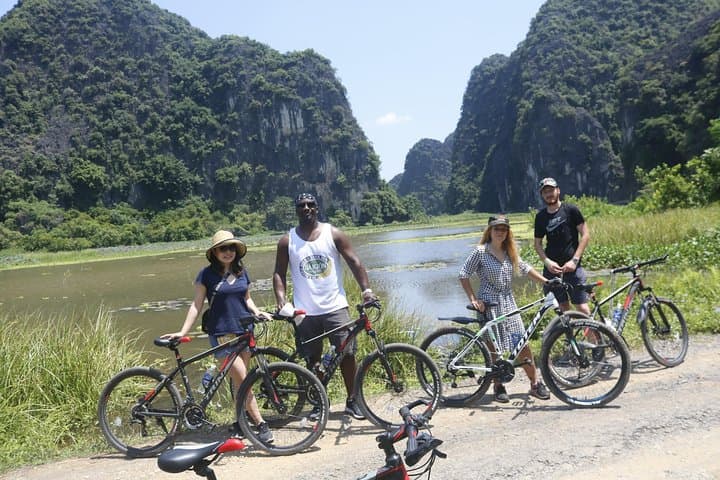 Full-Day Bicycle Tour of Red River Delta & Co Loa Ancient Citadel