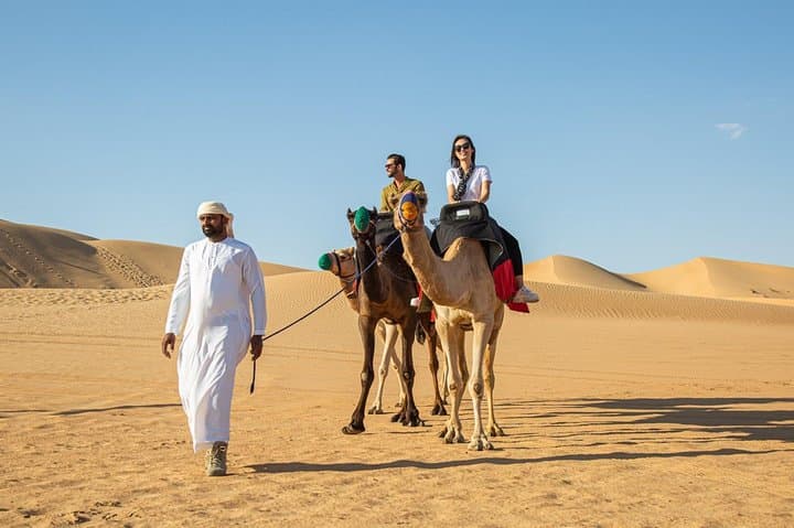 Evening Dubai Desert Safari: Dune Bashing, Camel Rides & BBQ Dinner