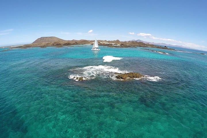 Catamaran Sailing to Isla de Lobos from Corralejo — 4-Hour Swim, Snorkel & Paella photo 2