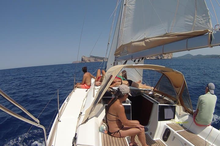 Sail the Coral Riviera: Alghero Full-Day Sailboat Trip with Lunch and Snorkel