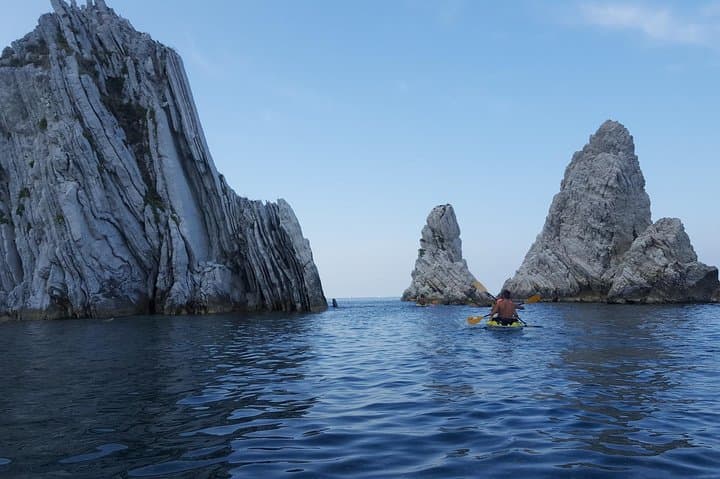 Sunrise Canoe to the Due Sorelle Cliffs on Monte Conero — Private Tour