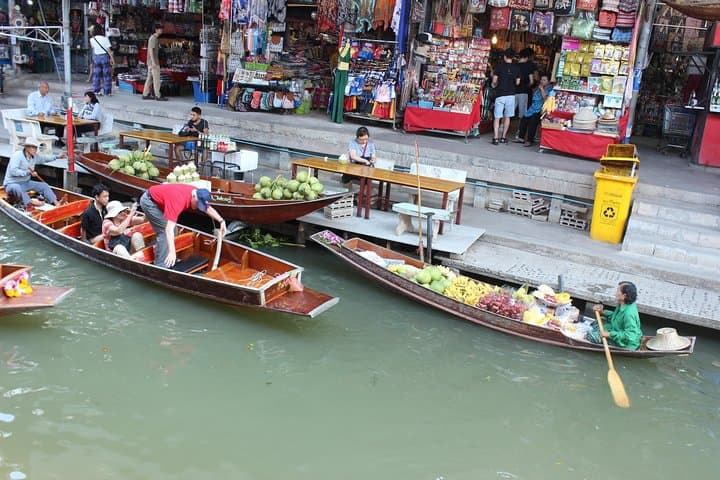 From Train Tracks to Emerald Pools: Damnoen Floating Market & Erawan Falls Day Tour photo 4