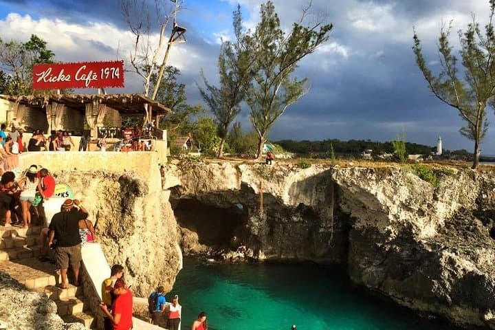Negril Ricks Sunset Cruise & Booby Cay Lobster Picnic with Cave Snorkeling