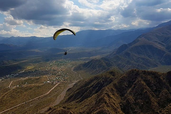 Tandem Paragliding Over Mendoza's Pre-Range: Cerro Arco Flight Experience photo 4