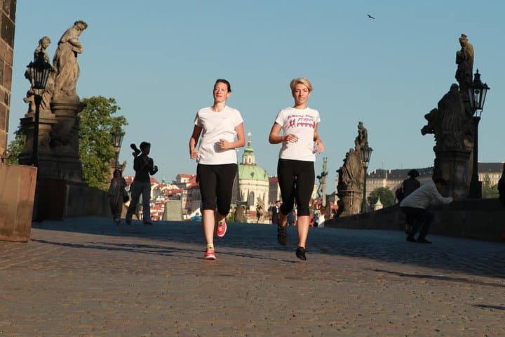 Run Prague's Classics: Guided 9–12K Sightseeing Tour