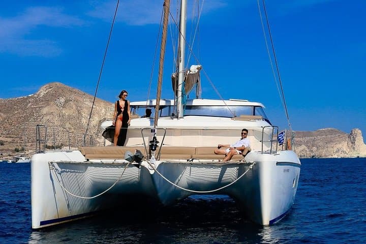 Santorini Private Day Cruise: Red Beach, Volcano Hot Springs & Greek Lunch photo 2