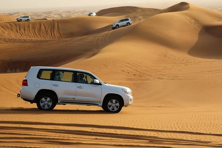 Sunrise Desert Safari in Al Khatim — Dune Bashing, Camel Rides & Sandboarding