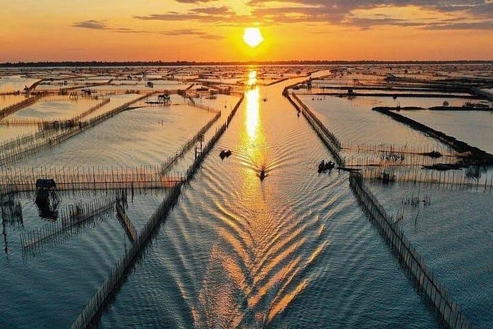 Scooter to Thanh Toan Bridge & Chuon Lagoon: Sunset Boat Trip and Seafood Dinner from Hue photo 2