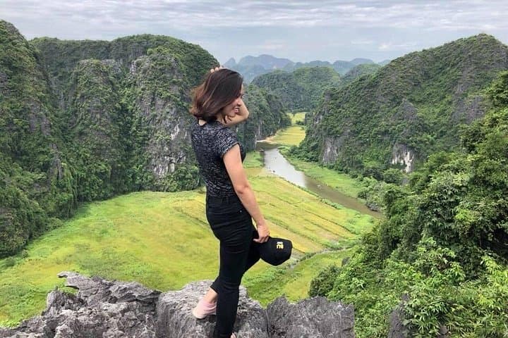Ninh Binh Day Trip: Hoa Lu, Trang An Boat Tour, Mua Cave Hike & Village Cycling photo 4