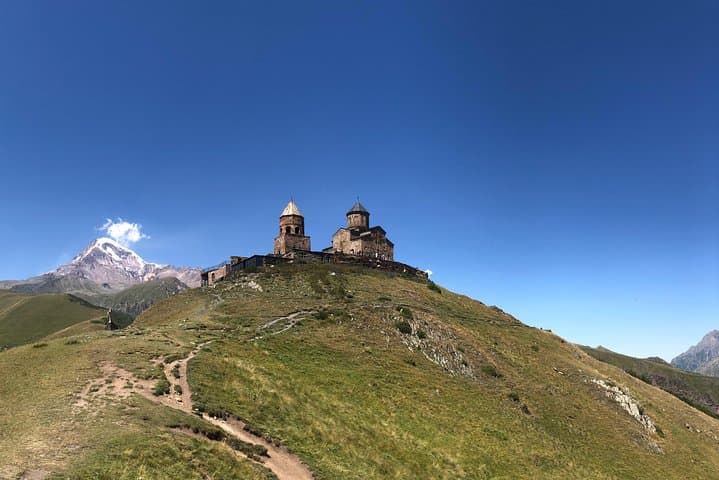 Georgian Military Road Day Trip to Kazbegi & Ananuri: Gergeti Church, Jvari Pass & Khinkali