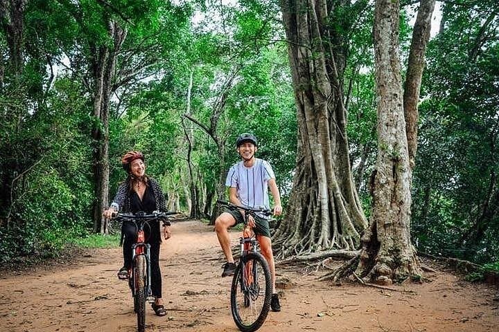 Siem Reap Bike Tour: Angkor Wat & Bayon — The Smiling Temple Ride photo 1