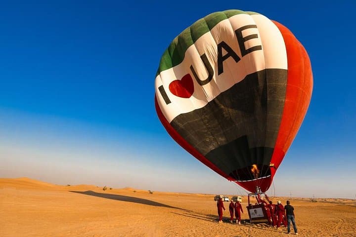 Dubai Sunrise Hot Air Balloon: Desert Flight with Gourmet Breakfast & Falcon Show photo 1