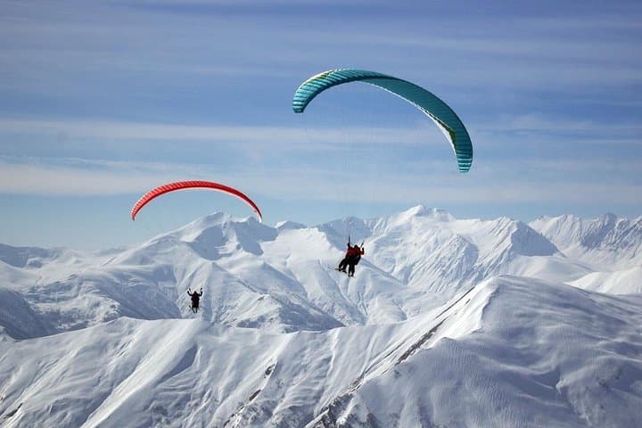 Gudauri Paragliding and Skiing Day Trip from Tbilisi: Freeride Slopes & Tandem Flights