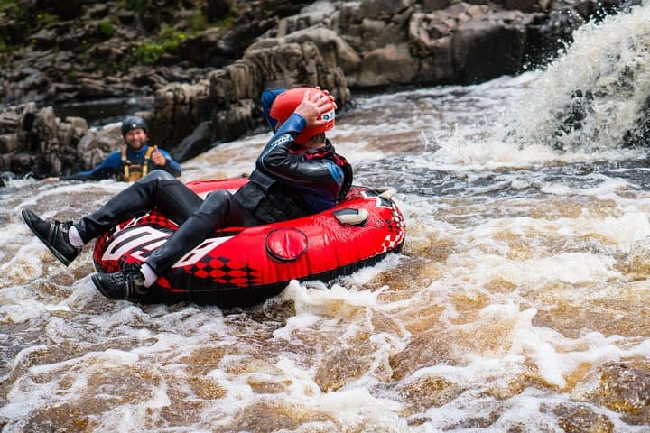 North Pennines White Water Tubing: Grade 4 River Adventure with Waterfall Jump photo 2