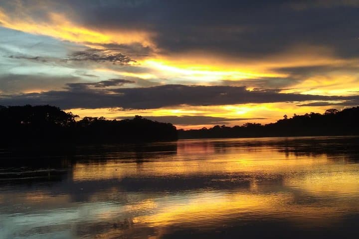 Sunset Kayak on the Tambopata — Wildlife, River Light & Calm Paddling from Puerto Maldonado