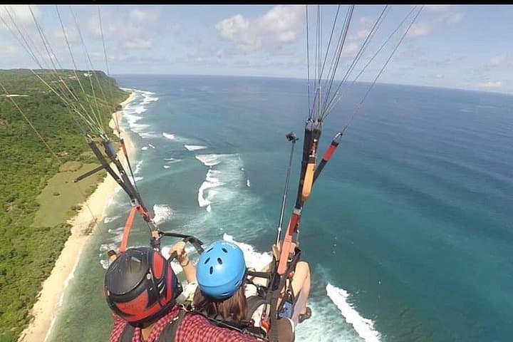 Tandem Paragliding Over Uluwatu Cliff: Bali Coastal Flight with Photos photo 2