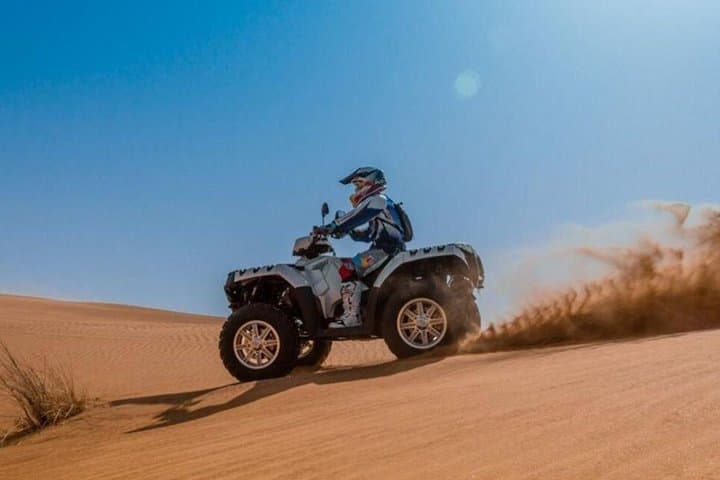 Dubai Dunes Half-Day Quad Bike Tour with Camel Ride & Sandboarding