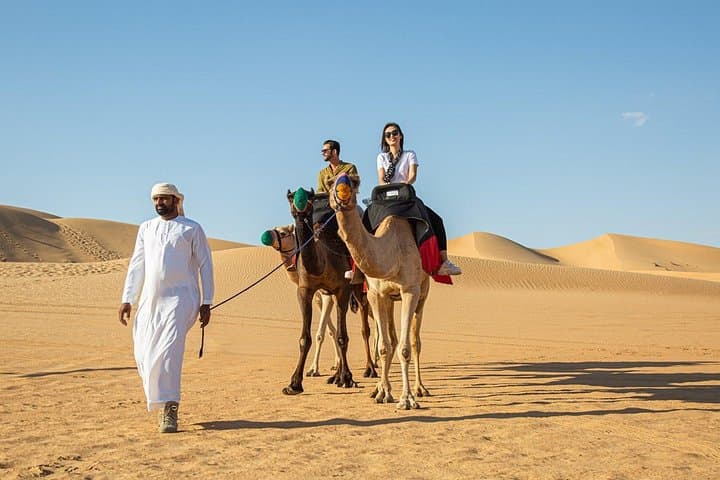 Morning Camel Trekking with Dune Bashing & Sand Boarding in Dubai Desert photo 6