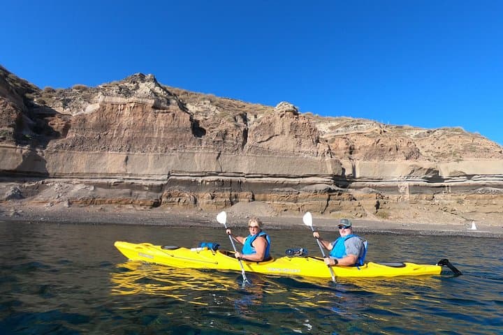 Santorini Sea Caves Kayak Trip — Snorkel, Cliff Jump & Beach Picnic photo 2