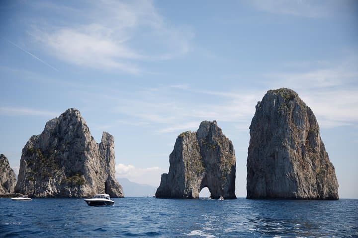 Private Capri Day Cruise: Blue Grotto, Faraglioni & Snorkel from Sorrento photo 3