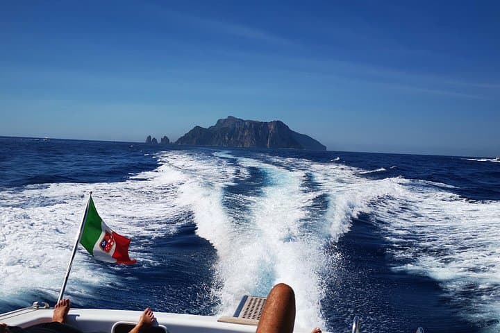 Private Full-Day Capri Boat Tour: Grottos, Faraglioni & Snorkeling photo 1
