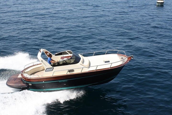 Private Capri Day Cruise: Blue Grotto, Faraglioni & Snorkel from Sorrento photo 4