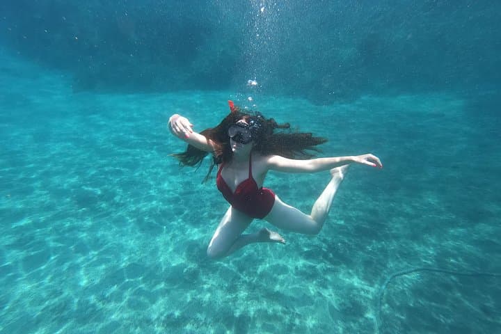 Santorini Sea Caves Kayak Trip — Snorkel, Cliff Jump & Beach Picnic photo 3