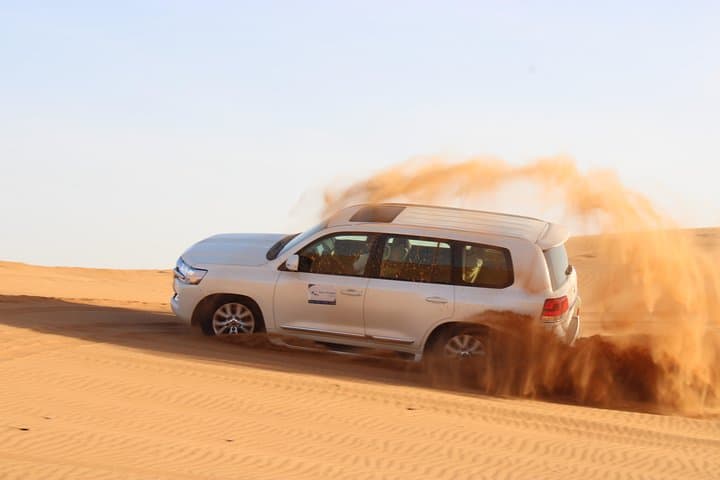 Lehbab Red Dunes Evening Safari — Dune Bashing, Sandboarding & BBQ Experience