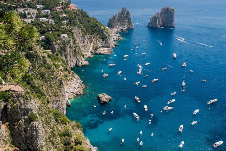 Semi-Private Capri Boat Tour: Grottos, Faraglioni & Marina Grande Escape
