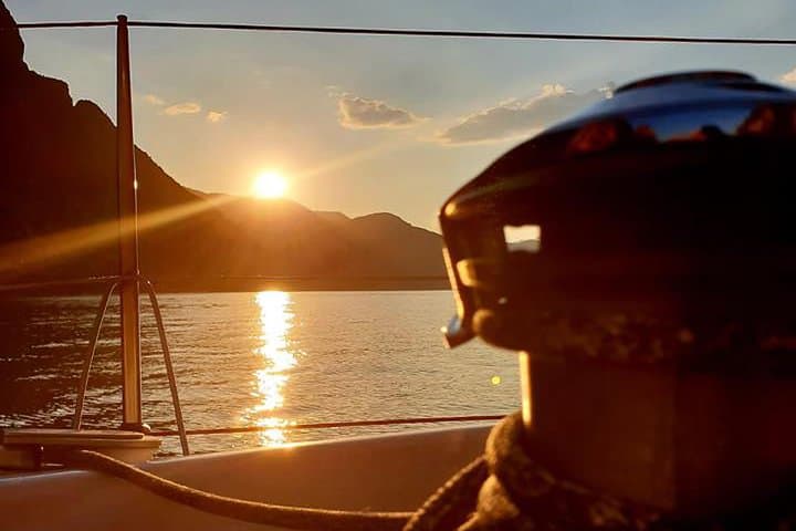 Sunset Sail on Lake Como: Aperitivo, Swim & Twilight Views from Malgrate