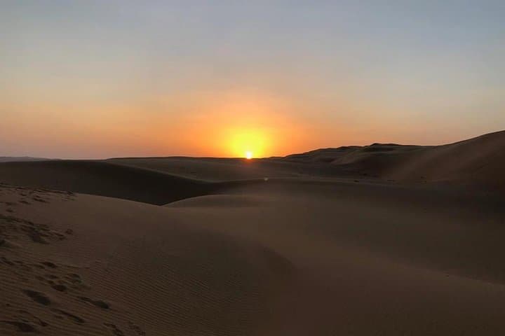 Dubai Sunrise Desert Tour: Sunrise Dune Drive & Sandboarding in the Arabian Desert photo 5