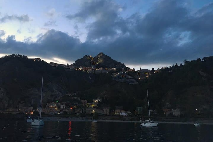 Moonlit Dinner Cruise in Catania: Anchored Supper at Capo Mulini