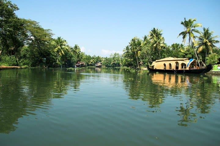 Overnight Alleppey Houseboat Cruise from Munnar — Private Kerala Backwaters Experience photo 4